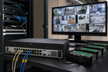 NVR connected to wired security cameras in an equipment room